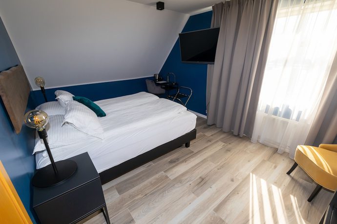 Imagen de la habitación del Hotel North. Foto 18