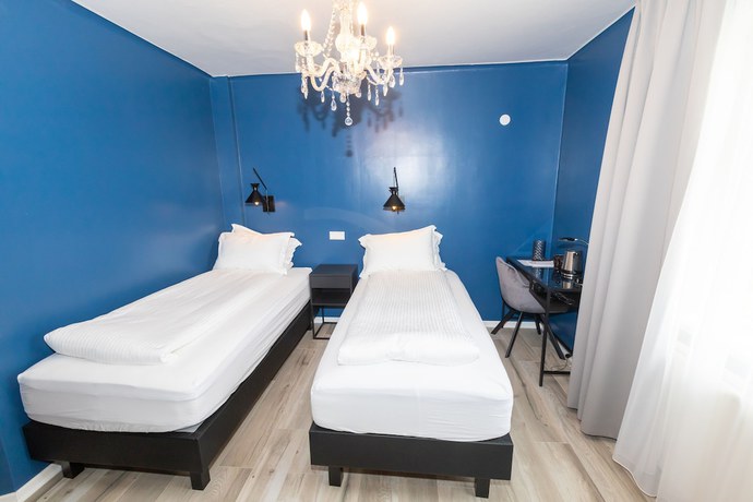 Imagen de la habitación del Hotel North. Foto 20