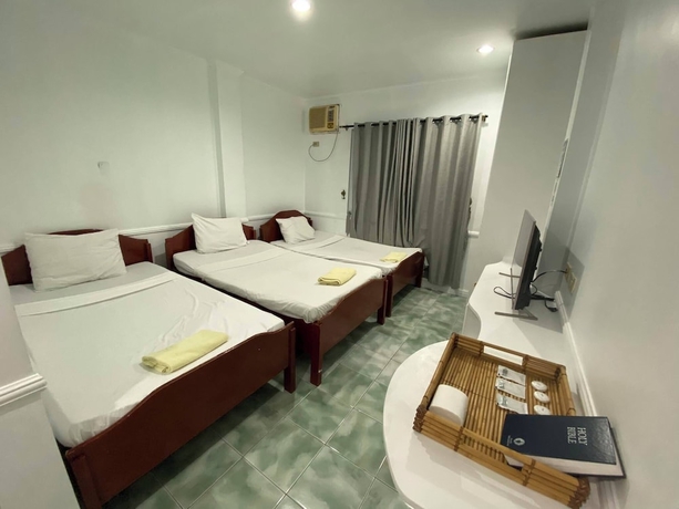 Imagen de la habitación del Hotel North Shores Inn. Foto 8