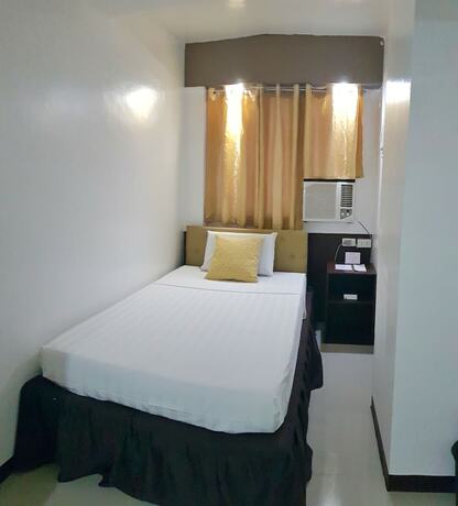 Imagen de la habitación del Hotel North Tourist Inn. Foto 14