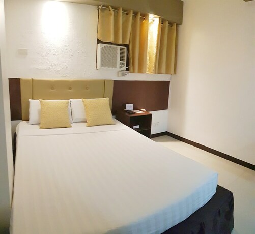 Imagen de la habitación del Hotel North Tourist Inn. Foto 15