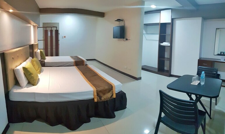 Imagen de la habitación del Hotel North Tourist Inn. Foto 17