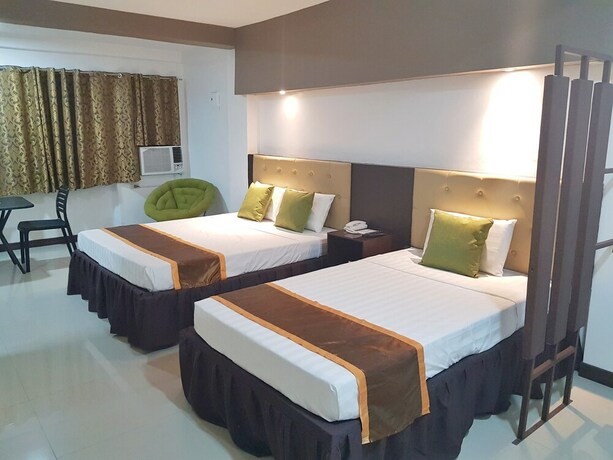 Imagen de la habitación del Hotel North Tourist Inn. Foto 18