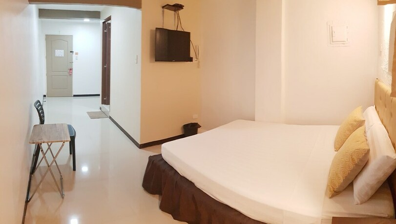 Imagen de la habitación del Hotel North Tourist Inn. Foto 26