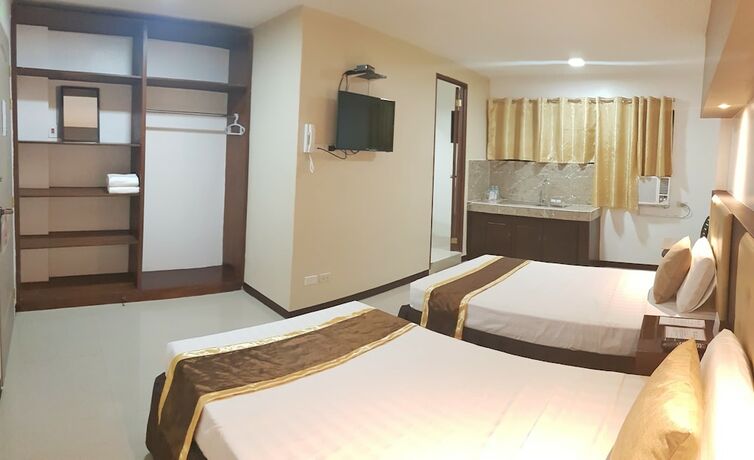 Imagen de la habitación del Hotel North Tourist Inn. Foto 27