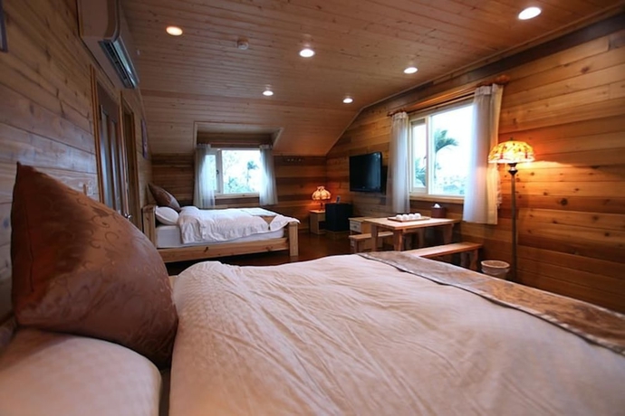 Imagen de la habitación del Hotel North Zart Homestay. Foto 2