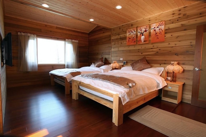 Imagen de la habitación del Hotel North Zart Homestay. Foto 10