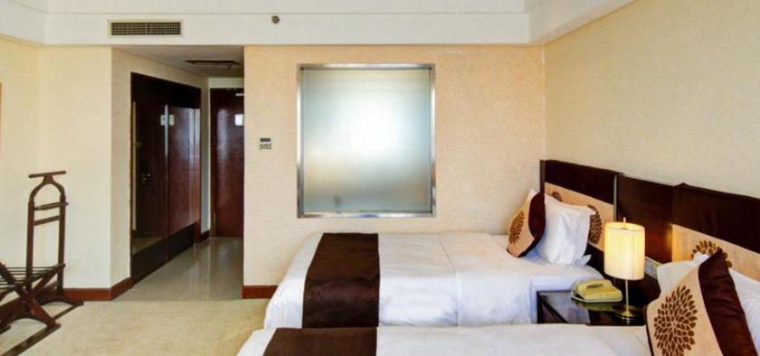 Imagen de la habitación del Hotel Northeast Hotel Group City International Hotel. Foto 7