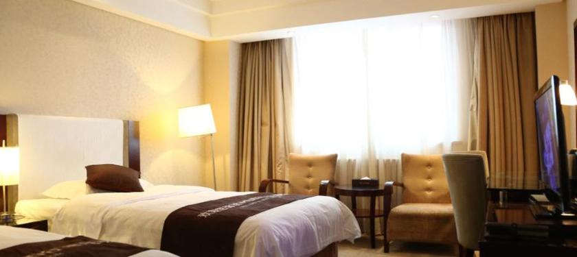 Imagen de la habitación del Hotel Northeast Hotel Group City International Hotel. Foto 12