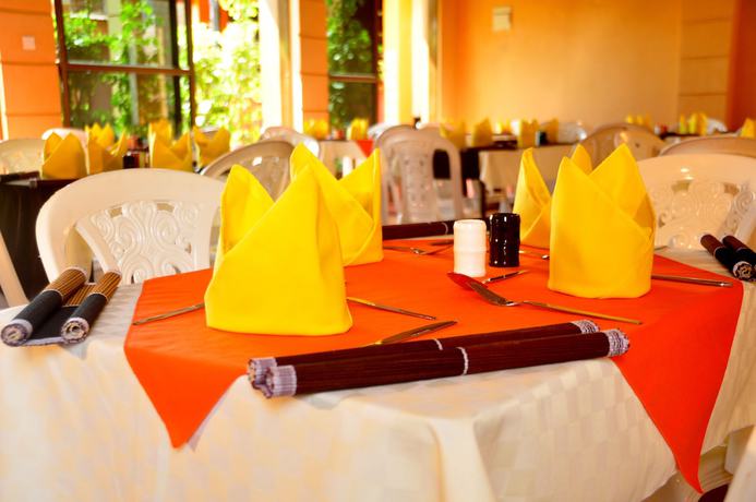 Imagen del bar/restaurante del Hotel Northroad Governor Villas. Foto 5