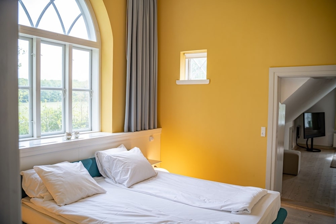 Imagen de la habitación del Hotel Nørre Vosborg. Foto 13