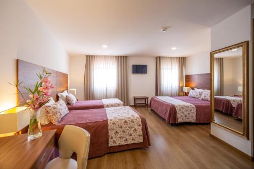 Imagen de la habitación del Hotel Nossa Senhora da Paz. Foto 18