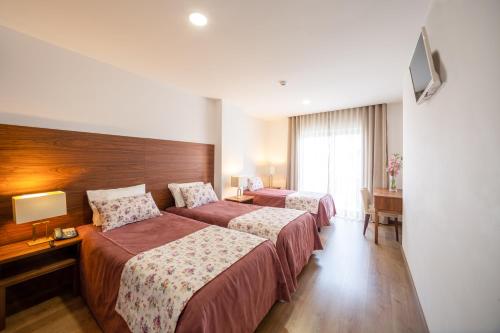 Imagen de la habitación del Hotel Nossa Senhora da Paz. Foto 19