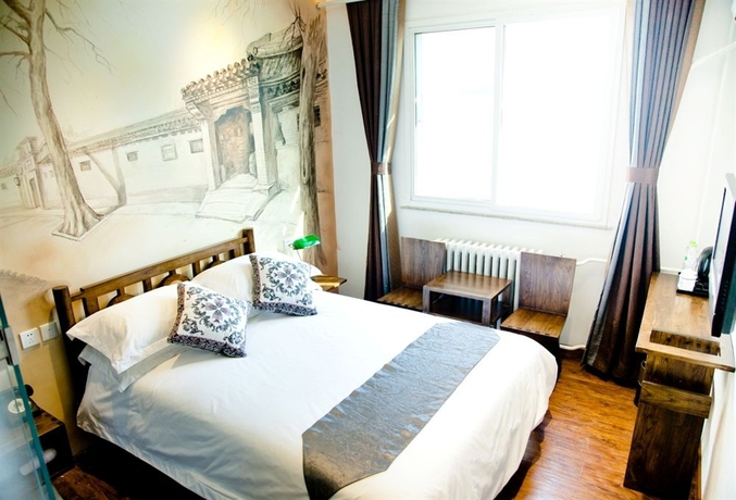 Imagen de la habitación del Hotel Nostalgia Beijing Yonghe Lama. Foto 4