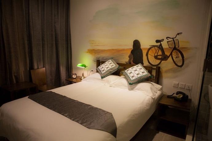 Imagen de la habitación del Hotel Nostalgia Beijing Yonghe Lama. Foto 7