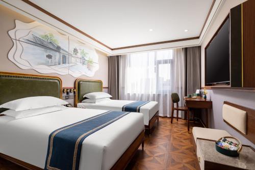 Imagen de la habitación del Hotel Nostalgia S - Beijing National Convention Center. Foto 19