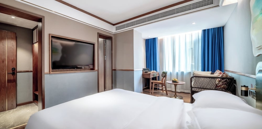 Imagen de la habitación del Hotel Nostalgia S(Kunming Dongfeng Square). Foto 6