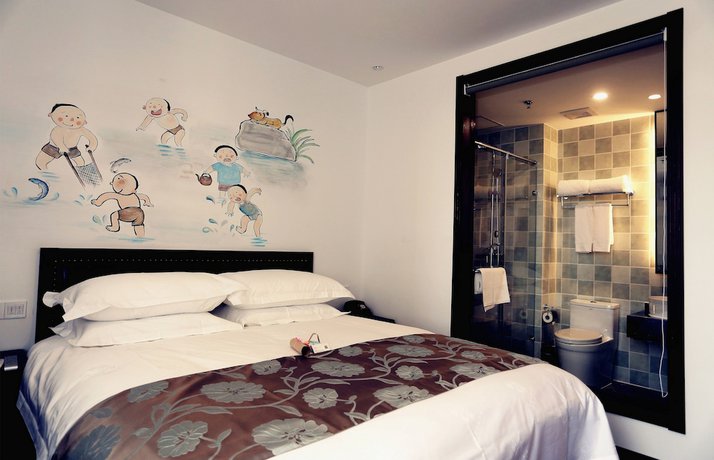 Imagen de la habitación del Hotel Nostalgia Zhangjiakou Victoria Sq. Foto 9