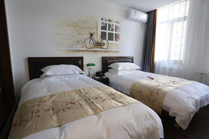 Imagen de la habitación del Hotel Nostalgia Zhangjiakou Victoria Sq. Foto 11