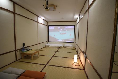 Imagen de la habitación del Hotel Nostalgic Coffee Inn Jiayuguan. Foto 9