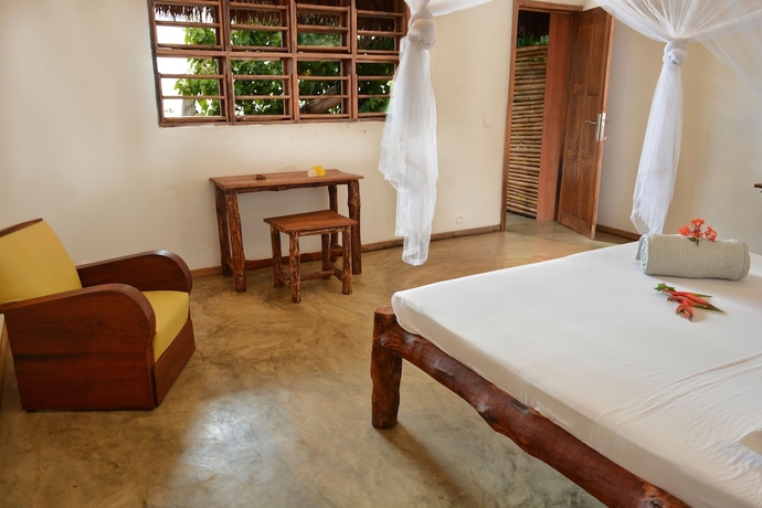 Imagen de la habitación del Hotel Nosy Lodge. Foto 13