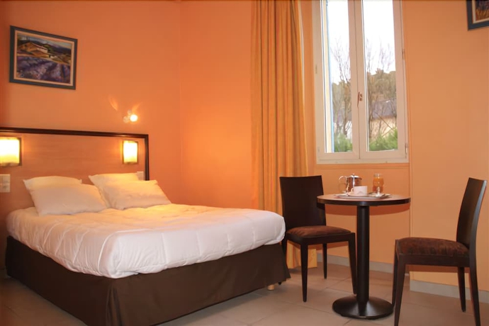 Imagen de la habitación del Hotel Notre Dame de Lumieres. Foto 4