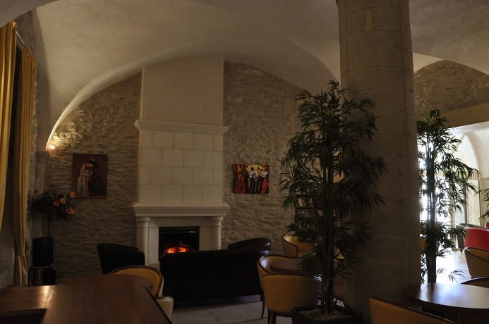 Imagen de la habitación del Hotel Notre Dame de Lumieres. Foto 7
