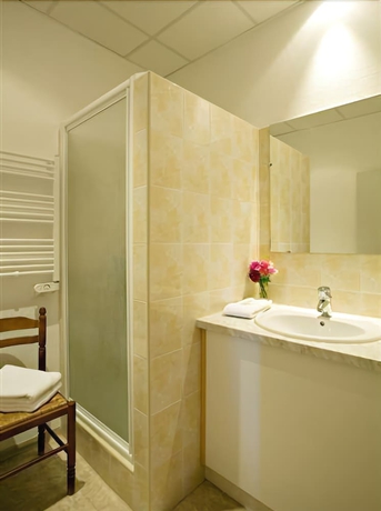 Imagen de la habitación del Hotel Notre Dame de Lumieres. Foto 14