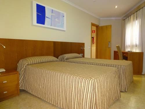 Imagen de la habitación del Hotel Nou Avenida. Foto 11