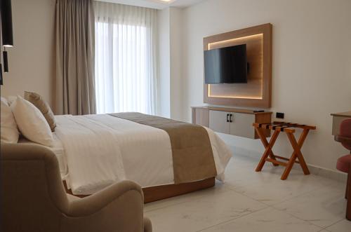 Imagen de la habitación del Hotel N&ouml;a, Machala. Foto 8