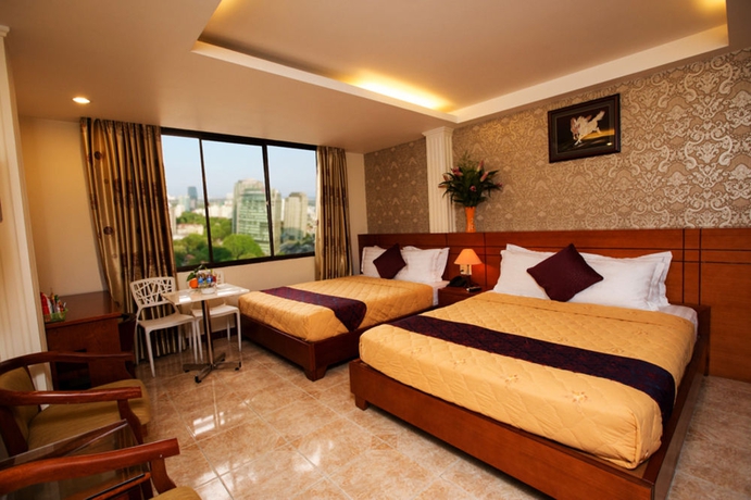 Imagen de la habitación del Hotel Nouveau Happy Inn. Foto 6