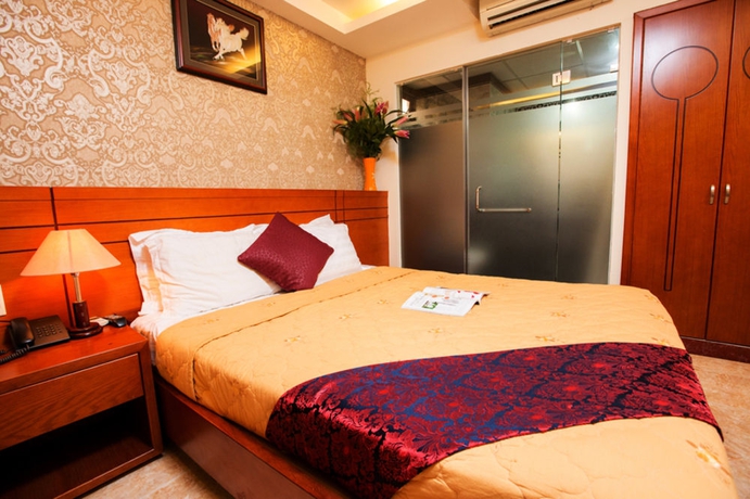 Imagen de la habitación del Hotel Nouveau Happy Inn. Foto 8
