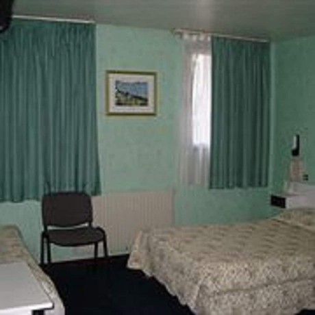 Imagen de la habitación del Hotel Nouveau Paris Park. Foto 6