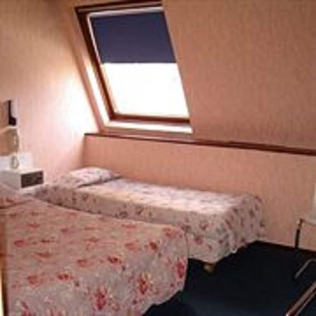 Imagen de la habitación del Hotel Nouveau Paris Park. Foto 7