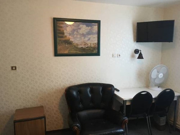 Imagen de la habitación del Hotel Nouveau Paris Park. Foto 11