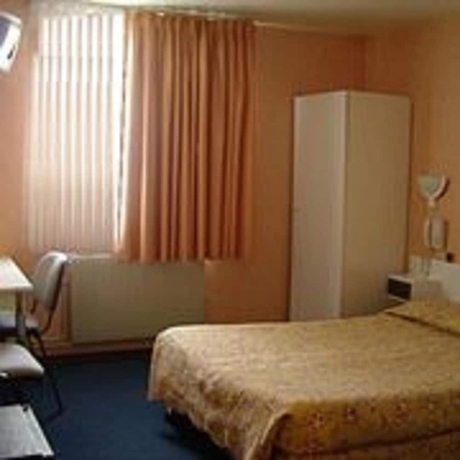 Imagen de la habitación del Hotel Nouveau Paris Park. Foto 12