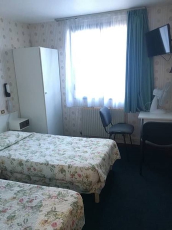 Imagen de la habitación del Hotel Nouveau Paris Park. Foto 13