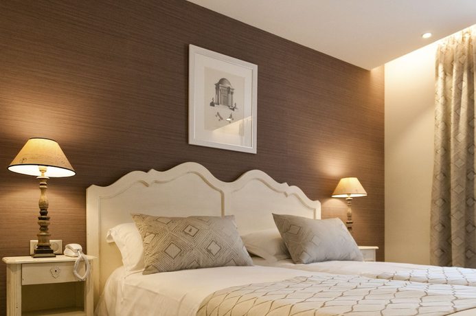 Imagen de la habitación del Hotel Nouvel H&ocirc;tel du Commerce. Foto 6