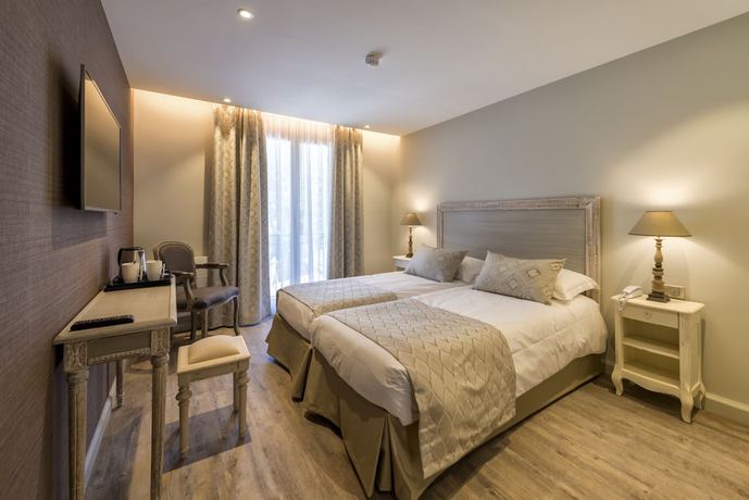 Imagen de la habitación del Hotel Nouvel H&ocirc;tel du Commerce. Foto 9