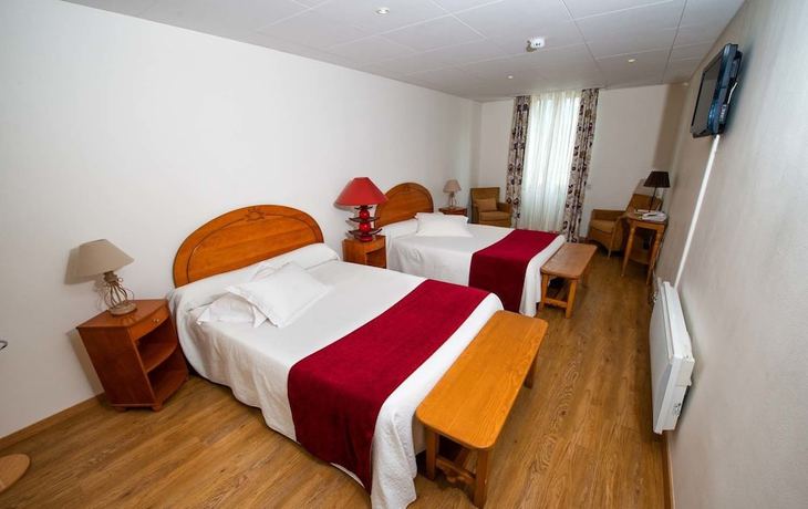 Imagen de la habitación del Hotel Nouvel H&ocirc;tel du Commerce. Foto 12
