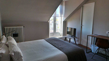 Imagen de la habitación del Hotel Nouvel, Oyonnax. Foto 11