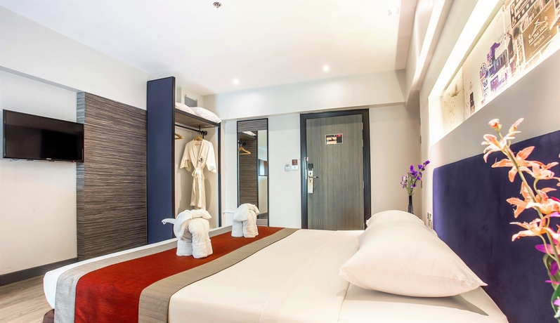 Imagen de la habitación del Hotel Nouvo City. Foto 13