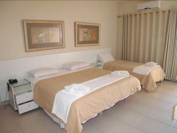 Imagen de la habitación del Hotel Nova Guarapari. Foto 12
