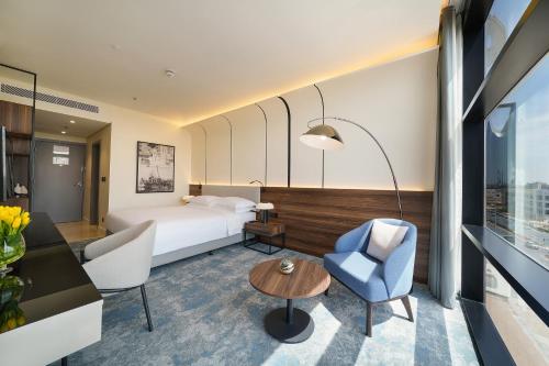Imagen de la habitación del Hotel Nova M, Edge by Rotana. Foto 9
