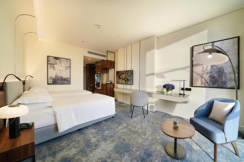 Imagen de la habitación del Hotel Nova M, Edge by Rotana. Foto 12