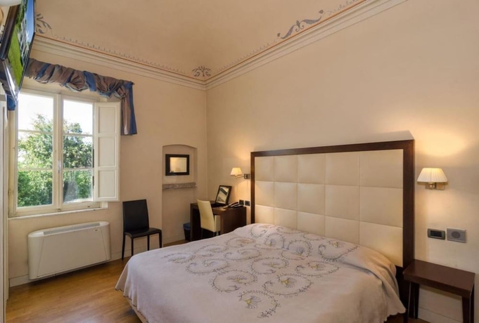 Imagen de la habitación del Hotel Novecento, Pisa. Foto 2