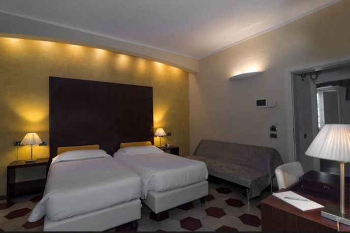 Imagen de la habitación del Hotel Novecento, Pisa. Foto 10