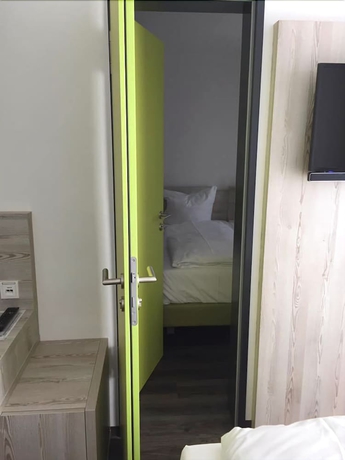 Imagen de la habitación del Hotel Novina Sleep Inn Herzogenaurach. Foto 8