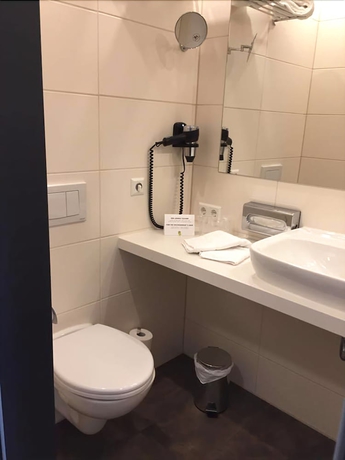 Imagen de la habitación del Hotel Novina Sleep Inn Herzogenaurach. Foto 17