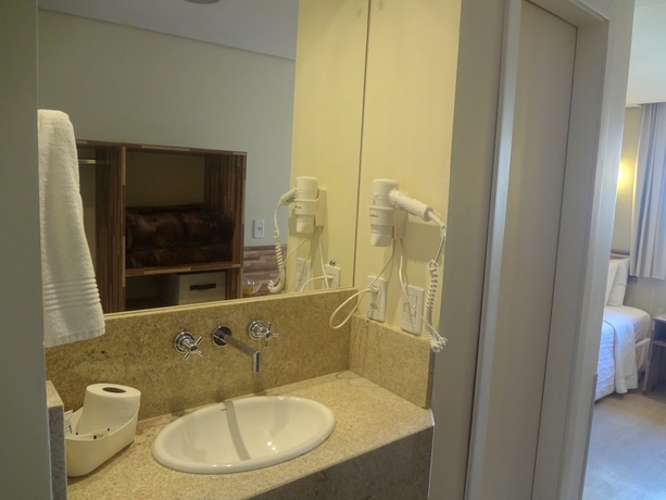 Imagen de la habitación del Hotel Novo Hamburgo Business. Foto 11